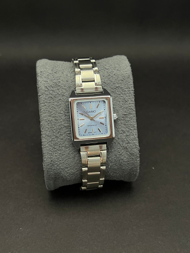 ساعت مچی زنانه مارک کاسیو بند استیل نقره ای -قاب تانکی مستطیلی صفحه آبی آسمانی