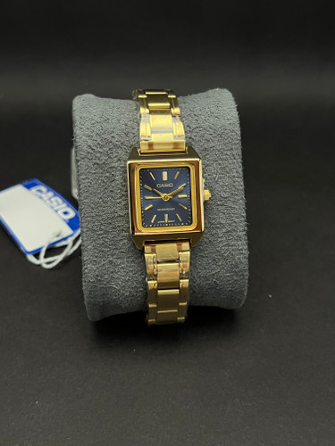 ساعت مچی زنانه مارک کاسیو بند استیل طلایی_قاب تانکی مستطیلی صفحه سرمه ای